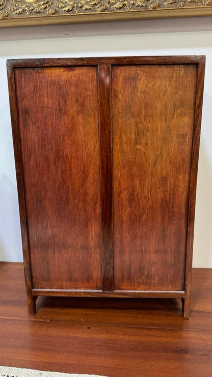 Oriental Cabinet in Carved Wood