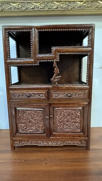 Oriental Cabinet in Carved Wood